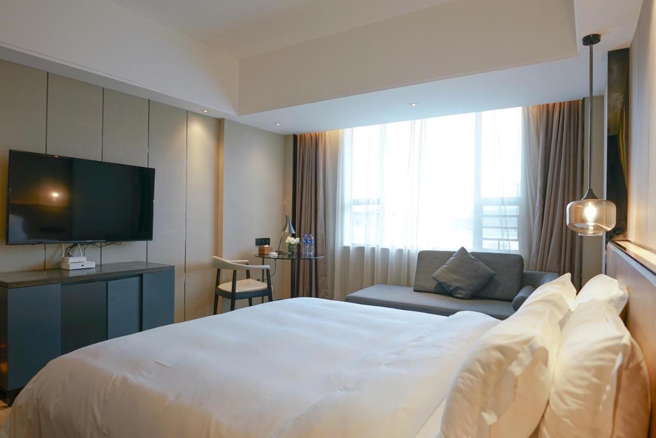 Paco Hotel Datang Metro Canton Esterno foto