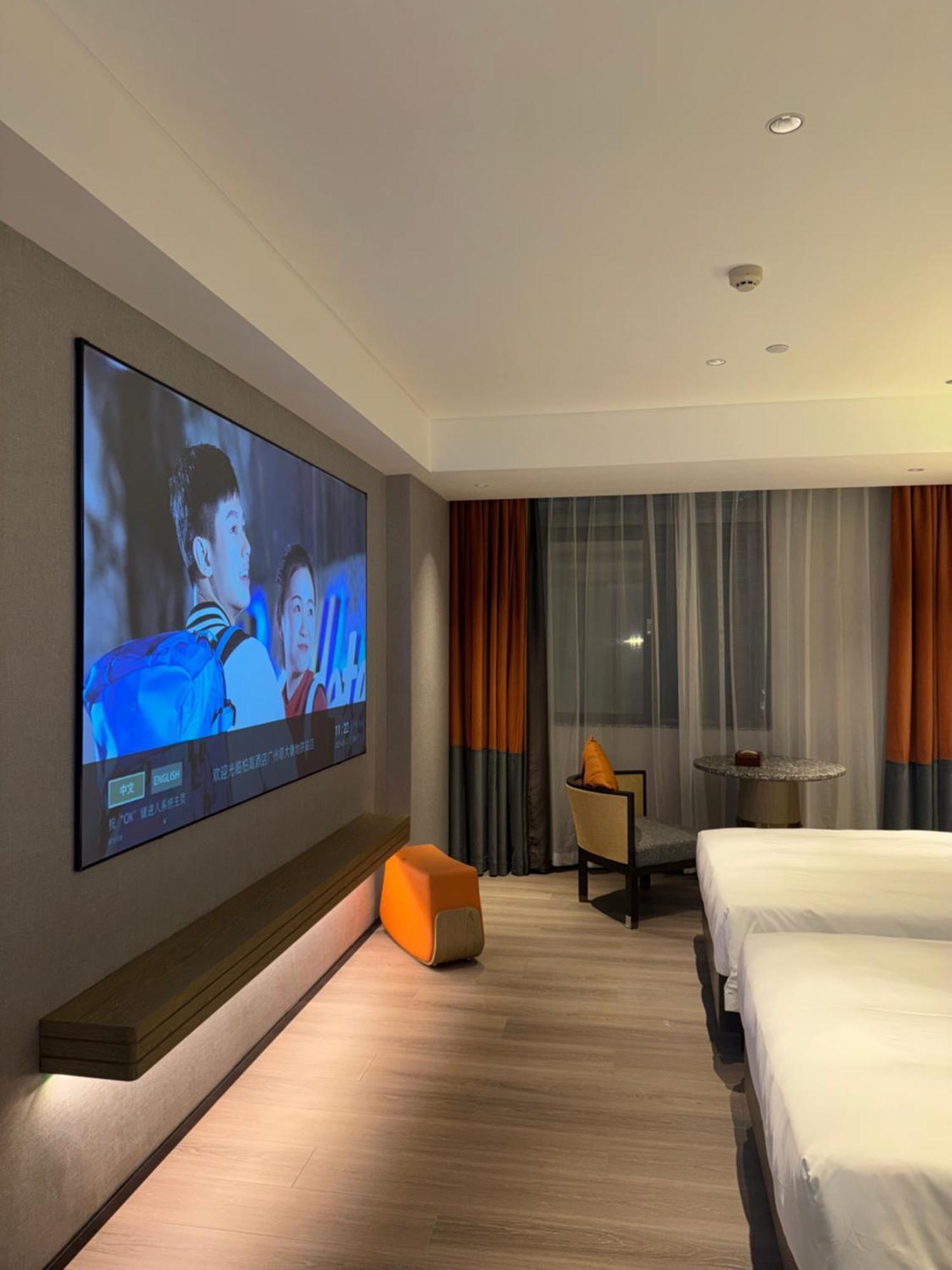 Paco Hotel Datang Metro Canton Esterno foto