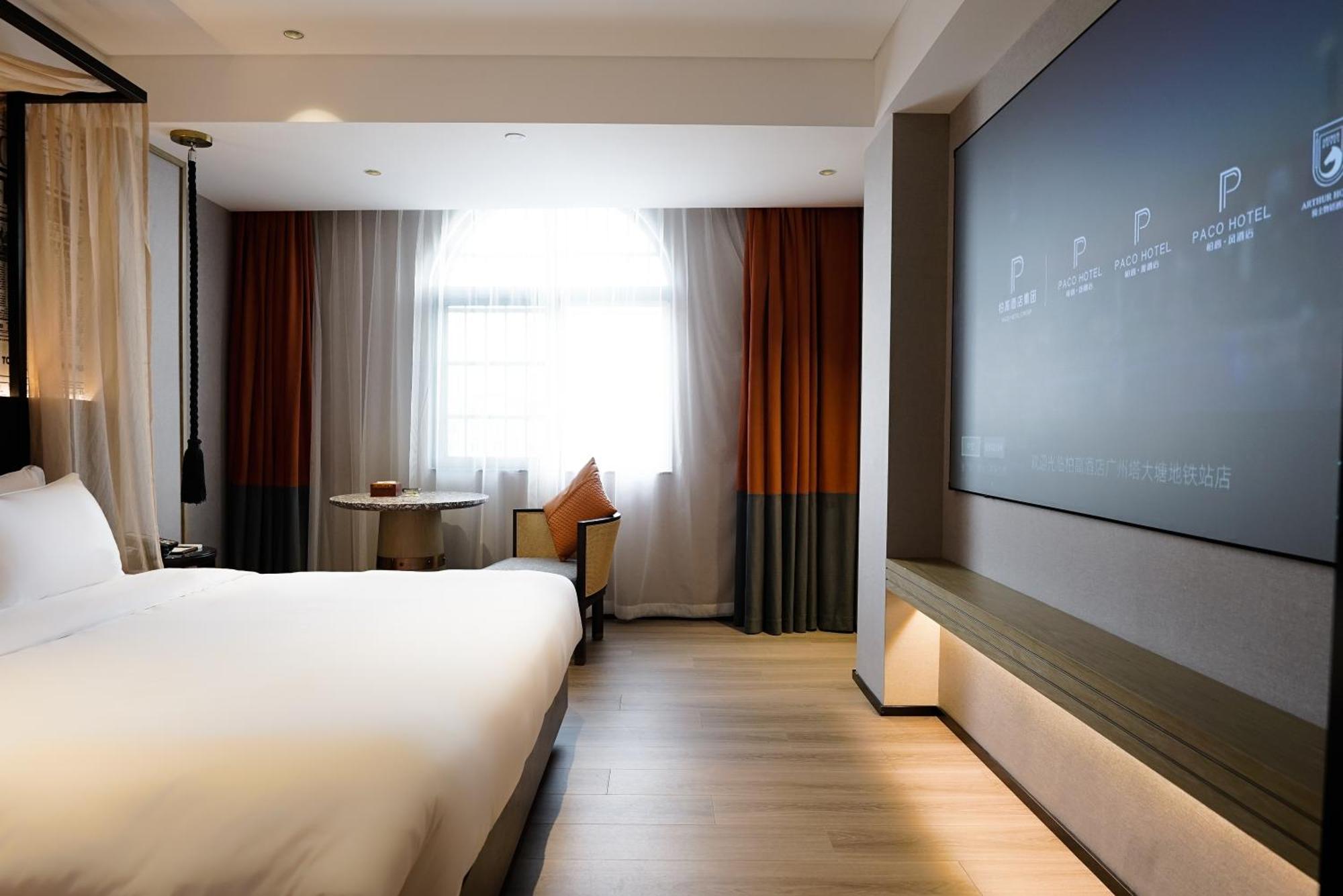 Paco Hotel Datang Metro Canton Esterno foto