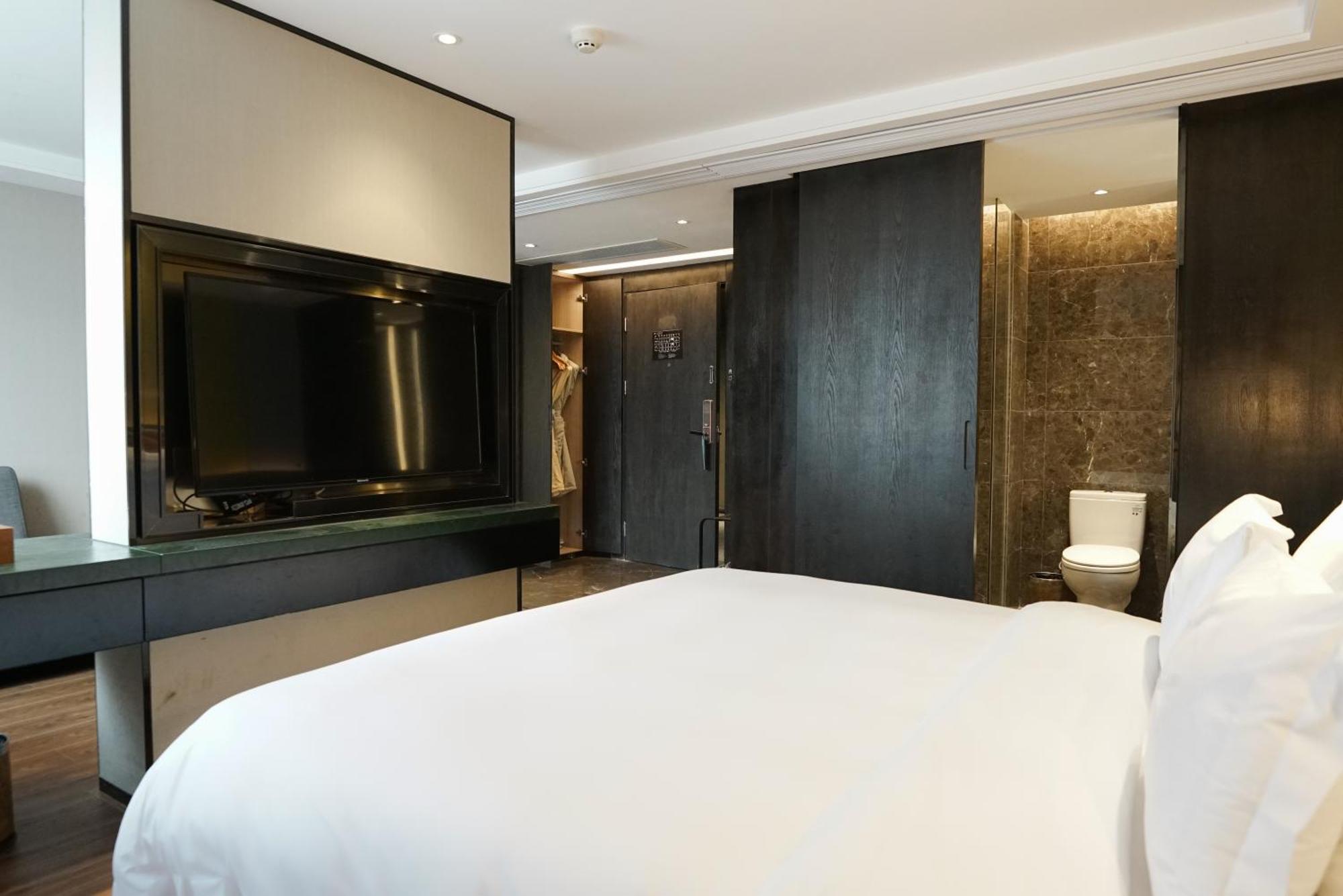 Paco Hotel Datang Metro Canton Esterno foto
