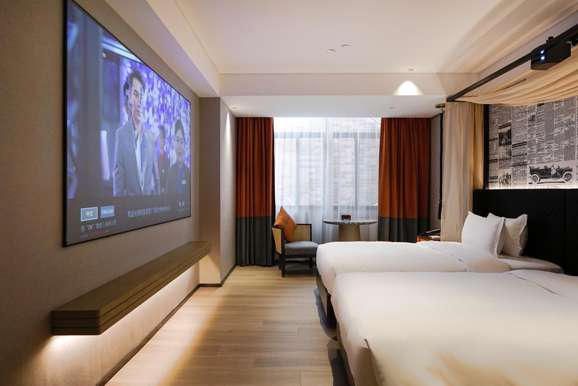 Paco Hotel Datang Metro Canton Esterno foto