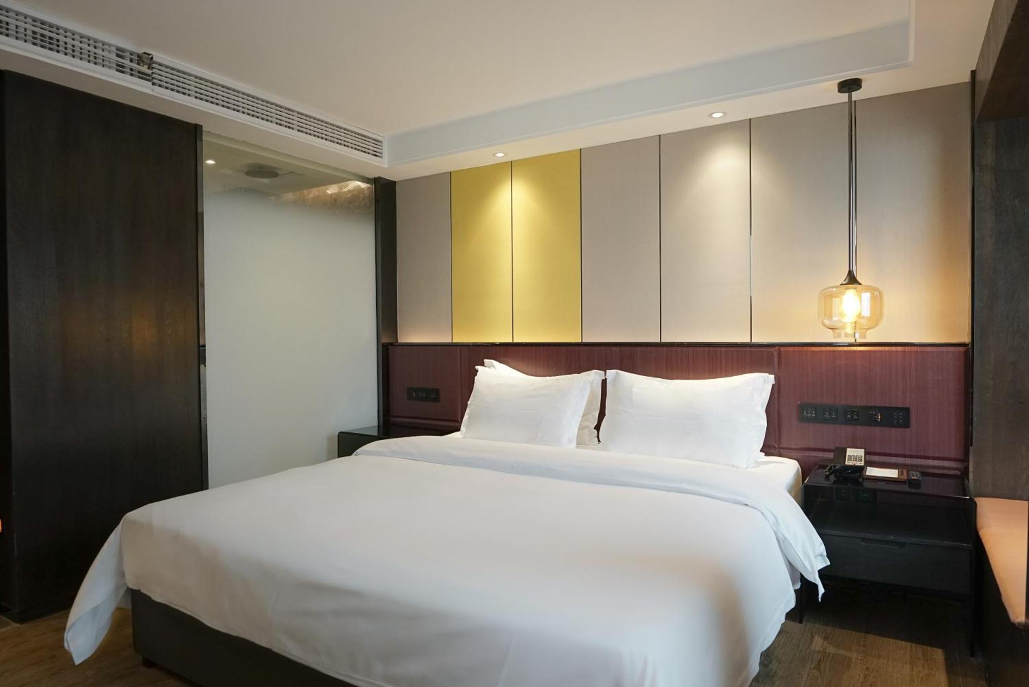 Paco Hotel Datang Metro Canton Esterno foto