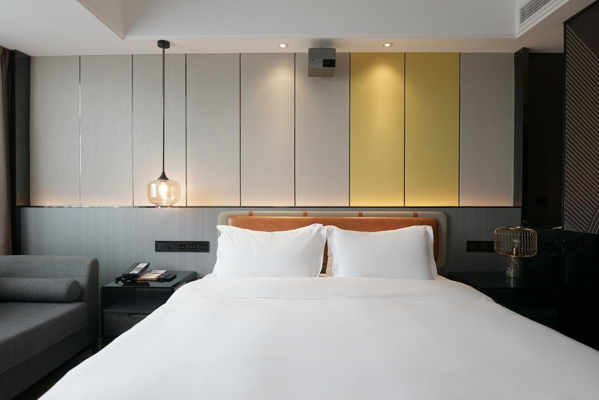 Paco Hotel Datang Metro Canton Esterno foto