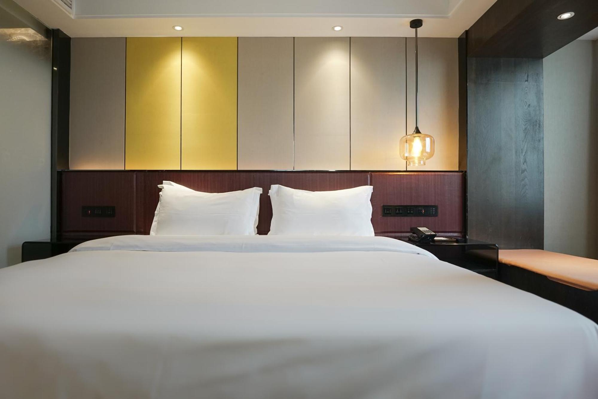 Paco Hotel Datang Metro Canton Esterno foto