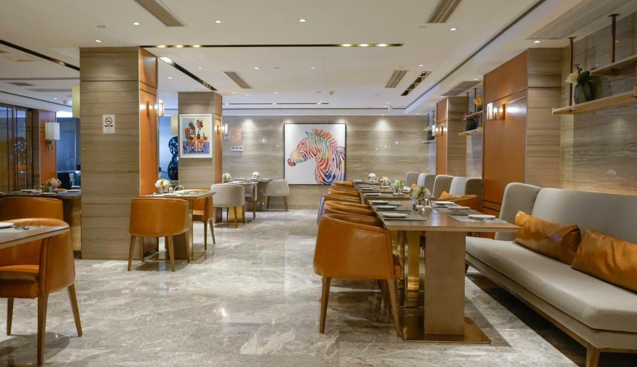 Paco Hotel Datang Metro Canton Esterno foto